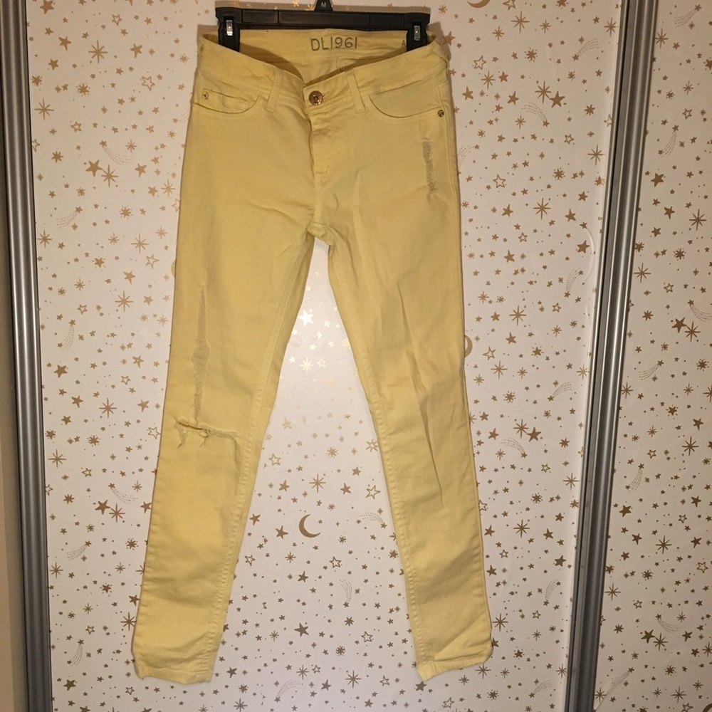 Yellow skinny distressed jeans